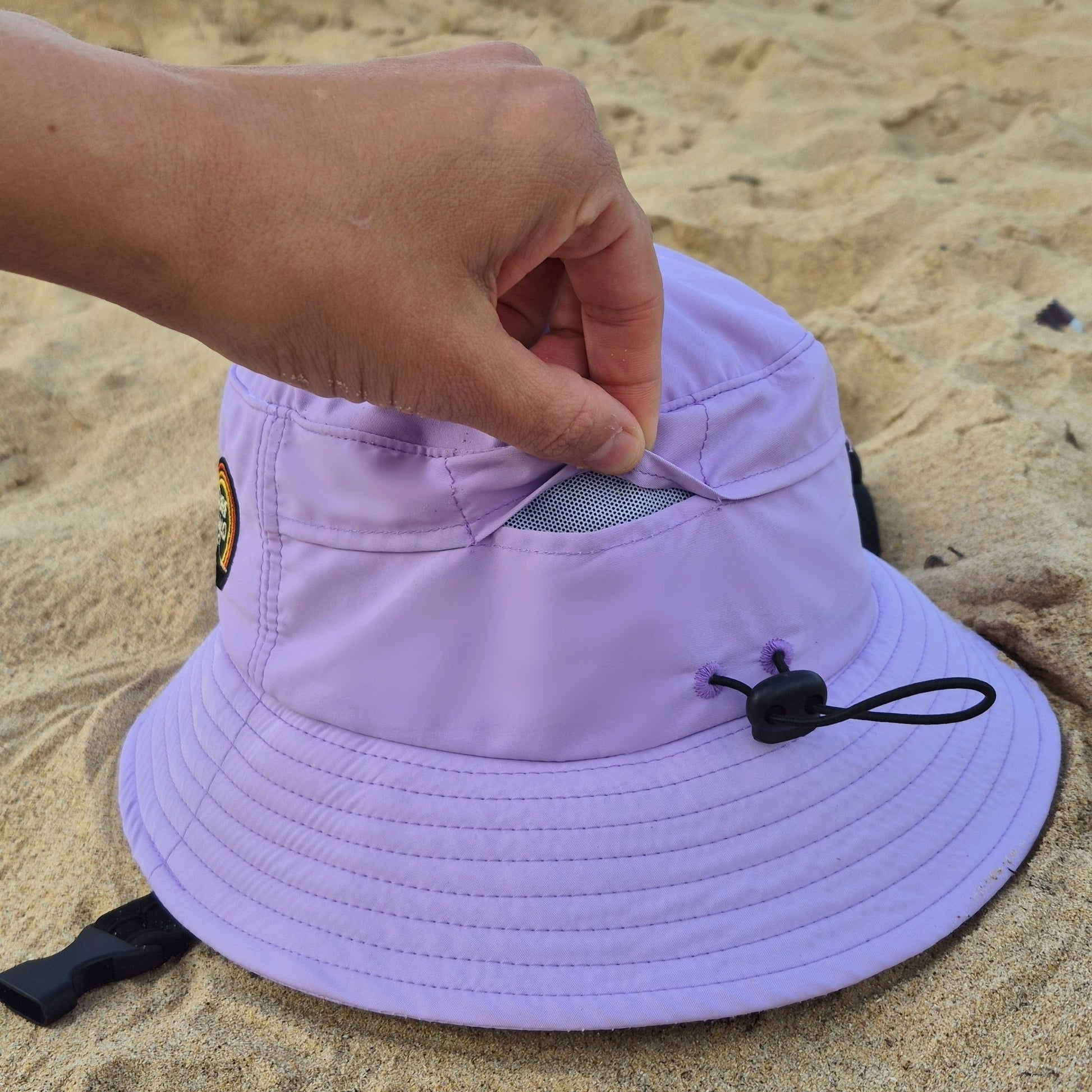 surf hat helmet purple pink view from the back mesh panel and adjustable elastic band pink